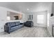 Inviting living room featuring a cozy fireplace and plush seating at 493 N 48Th Ave, Brighton, CO 80601