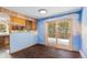 Bright dining room with sliding glass doors to deck at 746 Bow Mountain Rd, Boulder, CO 80304