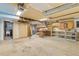 Unfinished basement with garage access and workbench at 746 Bow Mountain Rd, Boulder, CO 80304