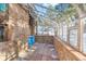 Charming sunroom features stone walls and a glass roof at 746 Bow Mountain Rd, Boulder, CO 80304