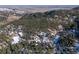 Aerial view of a mountain property with a home site and surrounding trees at 746 Bow Mountain Rd, Boulder, CO 80304