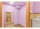 Small bathroom with purple walls and a vanity at 746 Bow Mountain Rd, Boulder, CO 80304