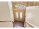 Interior view of entryway with staircase and double doors at 746 Bow Mountain Rd, Boulder, CO 80304