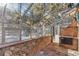 Bright sunroom with glass walls and a stone floor at 746 Bow Mountain Rd, Boulder, CO 80304