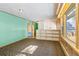 Living room with wood paneled walls and carpeted floors at 746 Bow Mountain Rd, Boulder, CO 80304