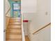 View of wooden staircase and hallway at 746 Bow Mountain Rd, Boulder, CO 80304