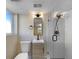 Updated bathroom with a modern vanity and glass shower at 762 S Simms St, Lakewood, CO 80228