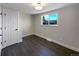 Bedroom with hardwood floors and ample closet space at 762 S Simms St, Lakewood, CO 80228