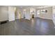 Bright and spacious entryway with dark hardwood floors and staircase at 762 S Simms St, Lakewood, CO 80228