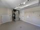 Laundry room with utility hookups and ample storage at 762 S Simms St, Lakewood, CO 80228