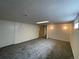 Unfinished basement with neutral carpeting at 3168 Vaughn St, Aurora, CO 80011