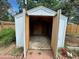 Ample storage in the backyard shed with double doors at 3168 Vaughn St, Aurora, CO 80011