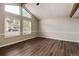 Bright bedroom with vaulted ceiling, hardwood floors and large windows at 3779 S Cathay Cir, Aurora, CO 80013