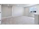 Spacious bedroom with neutral walls and carpeting at 3292 N Highlands Creek Pkwy, Aurora, CO 80019