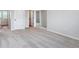 Spacious carpeted bedroom with multiple doors at 3292 N Highlands Creek Pkwy, Aurora, CO 80019