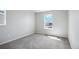 Bright bedroom with window, closet and access to bathroom at 3292 N Highlands Creek Pkwy, Aurora, CO 80019