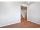 Bright, open basement with neutral walls and wood-look flooring at 3292 N Highlands Creek Pkwy, Aurora, CO 80019