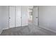 Spacious bedroom with double door closet and access to bathroom at 3292 N Highlands Creek Pkwy, Aurora, CO 80019