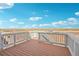 Deck overlooking a neighborhood with a view of the sky at 3292 N Highlands Creek Pkwy, Aurora, CO 80019