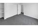 Spacious bedroom with wall-to-wall carpeting and a large closet at 22975 E Ontario Dr # 101, Aurora, CO 80016
