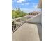 Private balcony overlooking the community with a view of neighboring homes at 22975 E Ontario Dr # 101, Aurora, CO 80016