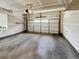Spacious two-car garage with overhead storage at 22975 E Ontario Dr # 101, Aurora, CO 80016