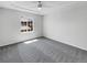 Bedroom with carpet, ceiling fan and window at 22975 E Ontario Dr # 101, Aurora, CO 80016