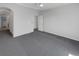 Primary bedroom with carpet and access to bathroom at 22975 E Ontario Dr # 101, Aurora, CO 80016