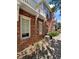 Brick home with a walkway and landscaping, showcasing the building's exterior at 22975 E Ontario Dr # 101, Aurora, CO 80016