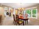 Elegant dining room with large windows and a chandelier at 4505 S Yosemite S St # 371, Denver, CO 80237
