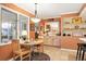 Kitchen with breakfast nook and view to backyard at 4505 S Yosemite S St # 371, Denver, CO 80237