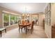 Bright dining room with large windows and a chandelier at 4505 S Yosemite S St # 371, Denver, CO 80237