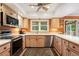 Bright kitchen with stainless steel appliances and light wood cabinets at 4505 S Yosemite S St # 371, Denver, CO 80237
