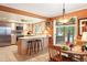 Updated kitchen with stainless steel appliances and breakfast nook at 4505 S Yosemite S St # 371, Denver, CO 80237