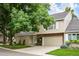Two-story townhome with attached garage and landscaping at 4505 S Yosemite S St # 371, Denver, CO 80237