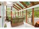 Sunroom with wicker furniture and abundant natural light at 4505 S Yosemite S St # 371, Denver, CO 80237
