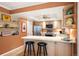 Updated kitchen with stainless steel appliances and breakfast bar at 4505 S Yosemite S St # 371, Denver, CO 80237