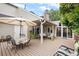 Spacious deck with seating, table, and umbrella at 4505 S Yosemite S St # 371, Denver, CO 80237