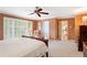 Main bedroom with access to a loft and wood furniture at 4505 S Yosemite S St # 371, Denver, CO 80237