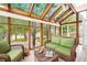 Sunroom with wicker furniture and abundant natural light at 4505 S Yosemite S St # 371, Denver, CO 80237