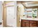 Bathroom with shower, double vanity, and mirror at 4505 S Yosemite S St # 371, Denver, CO 80237