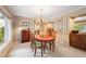 Spacious dining room with hardwood floors and built-in hutch at 4505 S Yosemite S St # 371, Denver, CO 80237