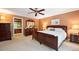 Spacious main bedroom with ensuite bathroom and wood furniture at 4505 S Yosemite S St # 371, Denver, CO 80237