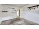 Unfinished basement with gray carpeting at 1281 Worley Dr, Denver, CO 80221