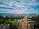 Building aerial view showcasing city and mountain views at 1133 Race St # 1B, Denver, CO 80206