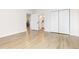 Light and airy bedroom with access to the bathroom and double closets at 1133 Race St # 1B, Denver, CO 80206