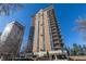 Ten-story building with brick facade and landscaping at 1133 Race St # 1B, Denver, CO 80206