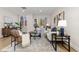Spacious living room with sliding glass doors leading to a private outdoor patio at 1133 Race St # 1B, Denver, CO 80206