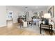 Light-filled living room with access to other rooms, showcasing a stylish and comfortable setup at 1133 Race St # 1B, Denver, CO 80206