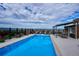 Inviting rooftop pool with a pergola, mountain views, and patio furniture at 1133 Race St # 1B, Denver, CO 80206
